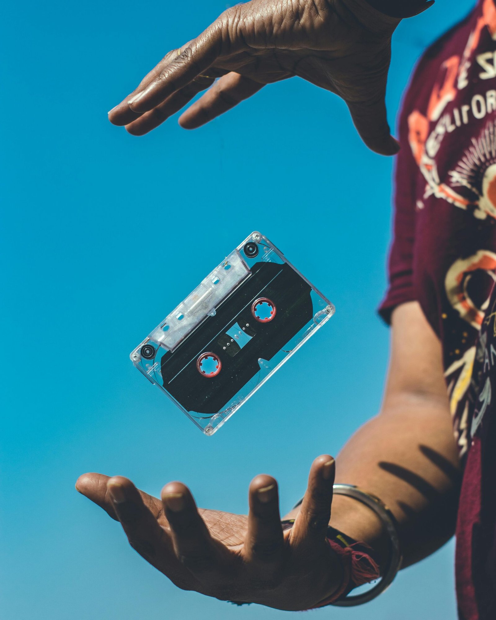 Person Doing Tricks on Cassette Tape